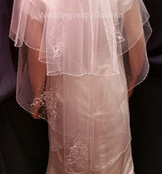 Wedding veil embroidered with beads, glass beads, pearls.