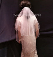 Wedding veil embroidered with beads, glass beads, pearls.