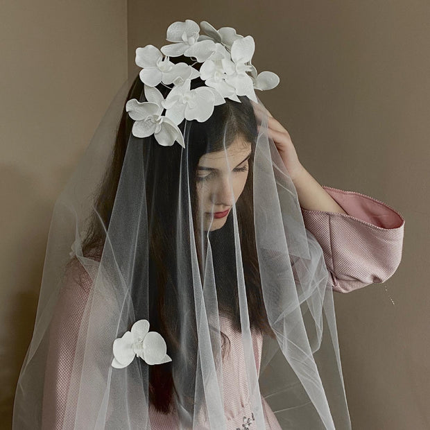 Veil with orchids flowers and a wreath. All flowers are handmade from foam eva.